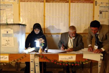 afp : Electoral employees start the process of counting the vote following nation wide provincial elections on January 31 2009, in Baghdad's Sadr City district. Millions of Iraqis voted