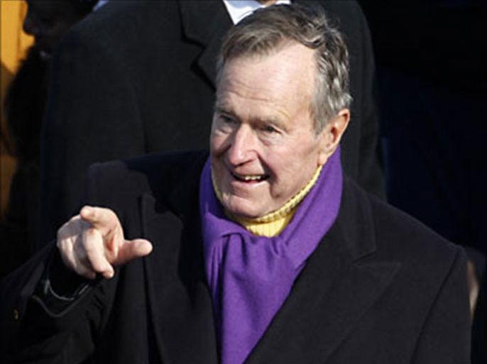Former U.S. President George H.W. Bush arrives for the inauguration ceremony of Barack Obama as the 44th President of the United States in Washington