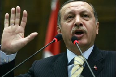 f/Turkish Prime Minister Recep Tayyip Erdogan addresses his Islamist-rooted Justice and Development Party deputies during a meeting at the Turkish Parliament in Ankara on January 6, 2009