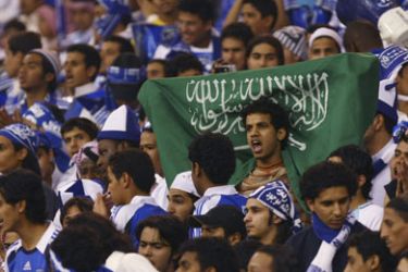 R/ Al Hilal fans cheer on their team during their Saudi Crown Prince Cup final soccer match against Al Shabab in Riyadh February 27, 2009.