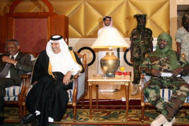afp/ Sudanese presidential adviser Nafie Ali Nafie (L), Qatari Prime Minister Sheikh Hamad bin Jassem al-Thani (2-L) and Sudanese rebel Justice and Equality Movement (JEM) leaders Khalil Ibrahim (2-R) and Taher al-Fakki (R) attend a Darfur peace meeting in the Qatari capital Doha on February 11, 2009.