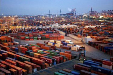r : General view taken from a container bridge shows the Container Terminal Burchardkai at Hamburg harbour in this January 14, 2008 file photo. The hive of activity at the