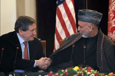 afp : Afghanistan President Hamid Karzai (R) shakes Hands with US special envoy to Afghanistan and Pakistan Richard Holbrooke (L) at the presidential palace in Kabul on February