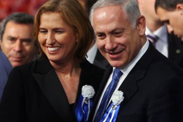 afp/ Israeli right-wing Likud party leader Benjamin Netanyahu (R) and centrist Kadima party leader Tzipi Livni attend the swearing-in ceremony of Israel's new knesset in Jerusalem on February 24, 2009.