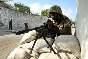 afp : Africa Union peacekeepers man the entrance to the presidential palace February 23, 2009 in the embattled Somalia capital Mogadishu where 11 Burundian AU soldiers