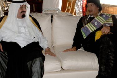 afp/ A handout picture from the Saudi News Agency (SPA) shows Saudi King Abdullah bin Abdul Aziz (L) in a reconciliation meeting with Libyan leader Moamer Kadhafi on the sidelines of the Arab League summit in Doha on March 30, 2009.