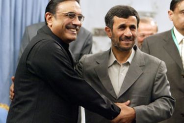 afp/ Iranian President Mahmoud Ahmadinejad (R) welcomes his Pakistani counterpart Asif Ali Zardari (L) at the presidential palace in Tehran on March 10, 2009.