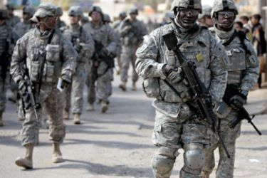 afp/ US soldiers are seen during the transfer of authority of the Shulla Joint Security Station from the US military LTC Vermeesch to the 2nd Battalion, 22nd Brigade, 6th Iraqi Army Division in Baghdad on March 02 2009.