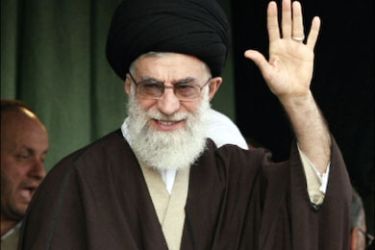 r : Iran's Supreme Leader Ayatollah Ali Khamenei waves to his supporters as he prepares to deliver a sermon during his visit to Mashhad, 741km (463 miles) east of Tehran, March
