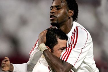 AFP (FILES) A picture dated November 02, 2007 shows top United Arab Emirates footballer Fayez Jomma celebrating with a teammate after scoring a goal for his local team Sharjah. Jomma was condemned to death along with his brother Mousa and another footballer Mohammad Najeeb for stabbing a man to death in a street fight, local media reported
