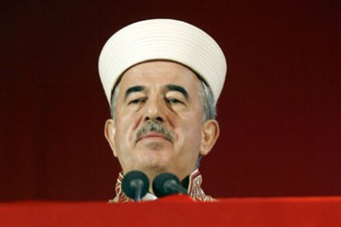 afp/ Turkish president for Religious Affairs Ali Bardakoglu prepares to deliver his address during an Islamic religious meeting in Antwerp on April 12, 2009.