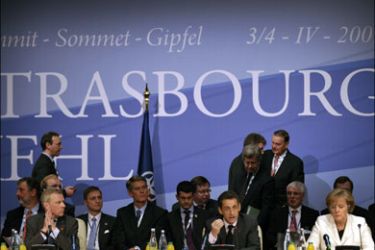 afp : NATO Secretary General General Jaap de Hoop Scheffer (L), French President Nicolas Sarkozy (C) and German Chancellor Angela Merkel attend the North Atlantic
