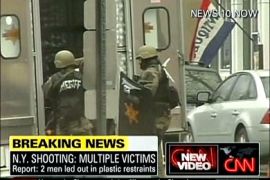 afp : In this framegrab taken from Cable News Network of a News 10 television broadcast, shows armed New York State sheriffs on April 3, 2009 in Binghamton, New York. Up to 13