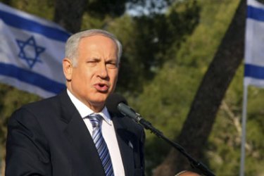 R/ Israel's Prime Minister Benjamin Netanyahu speaks during a ceremony marking the annual Memorial Day at Jerusalem's Ammunition Hill April 27, 2009.