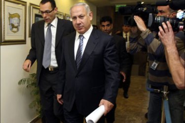 afp : Israeli Prime Minister Benjamin Netanyahu arrives to attend a cabinet meeting at his Jerusalem office on April 20, 2009. Netanyahu is not setting recognition of Israel as a state