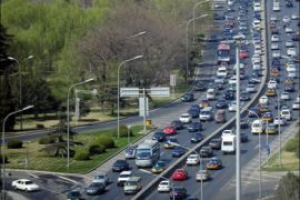 afp - Vehicles travel on the second ring road, one of the worst for traffic congestion in Beijing on April 6, 2009. Beijing has extended its post-Olympics traffic control measures for
