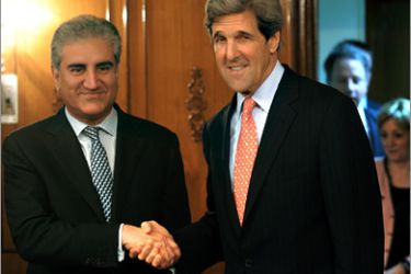 AFP - US Senator John Kerry (R) shakes hands with Pakistani Foreign Minister Shah Mehmood Qureshi prior to a meeting in Islamabad on April 13, 2009. Pakistan accused the United States and the West of generating "ill will" and warned US