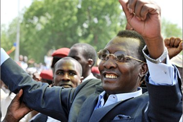 . AFP - Chadian President Idriss Deby Itno greets the crowd on May 13, 2009 on the Independence Plazza in Ndjamena as he leads around 10,000 anti-Sudanese demonstrators through the capital to protest what he said was Khartoum's support for a recent rebel offensive. Deby, who joined the march for a few hundred meters (yards) as it passed by the presidential