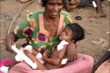 afp : This handout picture from pro-rebel LTTE organisation Tamilnet.com website shows what they claim are wounded civilians at the site of an attack by alleged Sri Lankan military