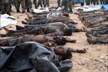 afp : This handout picture released by The Sri Lankan Defence Ministry released on May 19, 2009, shows what the army says are bodies of Tamil Tiger rebels they killed