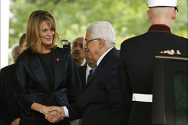 R_Palestinian President Mahmoud Abbas arrives at the White House in Washington to meet with U.S. President Barack Obama May 28, 2009