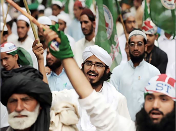 AFP - Pakistani Islamists shout slogans as they march during an anti-Taliban and anti-US protest rally in Islamabad on May 4, 2009. A peace deal in Pakistan appeared close to unravelling as authorities threatened to resume military