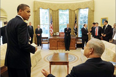 AFP - A handout picture released by the Israeli Government Press Office shows Israeli Prime Minister Benjamin Netanyahu (seated R) in the foreground talking to US President Barak Obama during their meeting in the White House on May 18, 2009. The two leaders met at the Oval Office for an intense first summit which stretched an hour over its allotted time of
