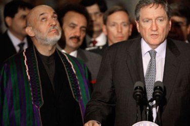WASHINGTON - MAY 07: Special Representative Richard Holbrooke (R) speaks while flanked by Afghanistan President Hamid Karzai on Capitol Hill May 7, 2009 in Washington, DC