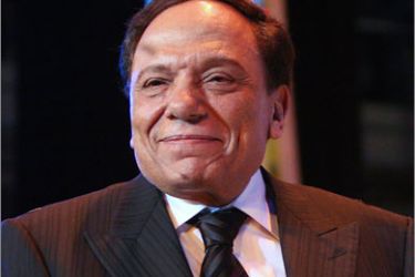 A picture taken on August 30, 2008 shows veteran Egyptian comedian Adel Imam smiling as he receives an award for his achievements in 2008 during the closing ceremony of the 24th International Film Festival for Mediterranean Countries, in Alexandria