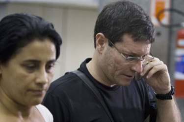afp/ A Brazilian relative of a passenger onboard Air France flight AF447 speaks on his mobile phone as he tries to get information at Rio de Janeiro's International airport, on June 1, 2009, after the jet carrying 228 people from Rio de Janeiro to Paris went missing over the Atlantic.