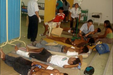 afp - ISeveral indigenous demonstrators wounded during clashes with riot police are treated June 5, 2009 in the hospital of Bagua, some 1000 km north of Lima. Nine