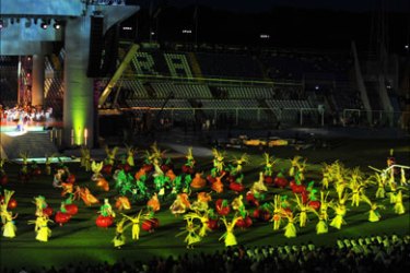 Volunteers perform during the opening ceremony of the XVI Mediterranean Games in Pescara on June 26, 2009.