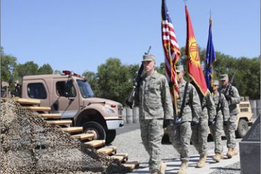 U.S. servicemen march during a change of command ceremony at Manas Air Base near Kyrgyzstan's capital Bishkek June 15, 2009