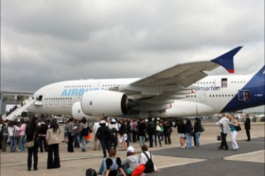 Visitors look at the Airbus A380 on June 18, 2009 at the 48th International Paris Air Show at Le Bourget airport