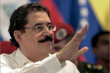 Honduras' President Manuel Zelaya waves during an ALBA emergency meeting in Nicaragua June 29, 2009