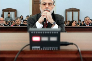afp : WASHINGTON - JUNE 03: Federal Reserve Board Chairman Ben Bernanke sits at the witness table while participating in a House Budget Committee on Capitol Hill