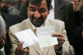 Secretary of the Expediency Council arbitration body and Iran's presidential election candidate Mohsen Rezai shows
