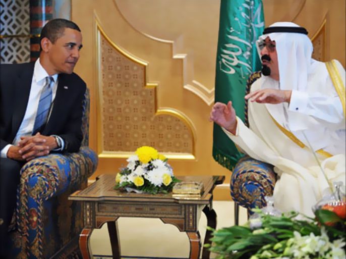 Saudi King Abdullah bin Abdul Aziz al-Saud (R) speaks with US President Barack Obama during a welcoming reception at the king's ranch in al-Janadriya in the outskirts of Riyadh
