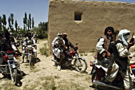 r : Taliban fighters ride on motorbikes in an undisclosed location in Afghanistan July 14, 2009. Around 4,000 U.S. Marines and hundreds of NATO and Afghan forces are taking