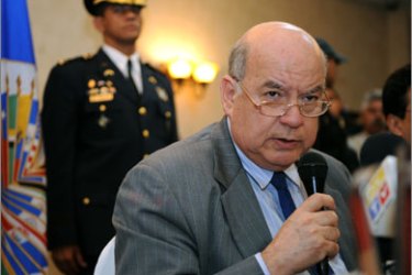 OAS General Secretary Jose Miguel Insulza speaks during a press conference in a hotel on July 3, 2009 in Tegucigalpa. The head of the Organization of American States (OAS) was due here Friday for talks to try to resolve the political mayhem triggered in Honduras by the ousting of President Manuel Zelaya