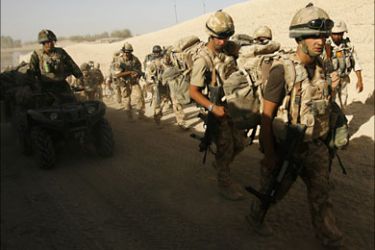 British soldiers from B Company, 2 Mercian set off on an operation in Malgir, Helmand province July 27, 2009. REUTERS