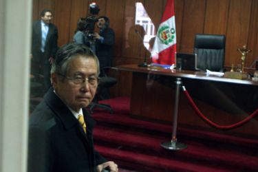 Peru's former President (1990-2000) Alberto Fujimori looks on during a hearing at a courtroom in Lima, on Monday 20, 2009. A Peruvian court has convicted and sentenced Fujimori to seven years, six months in prison for embezzlement after the former Peruvian president admitted to illegally paying his spy chief $15 million in state funds