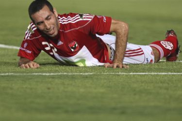 Al-Ahly's Mohamed Aboutrika reacts after missing a scoring opportunity against Haras El Hodood during their Egyptian Super Cup soccer match at Military Stadium in Cairo