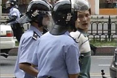 A photograph published on the social networking website Twitter on July 6, 2009 purportedly shows police detaining a man on a street in Urumqi, Xinjiang Uygur Autonomous Region July 5, 2009