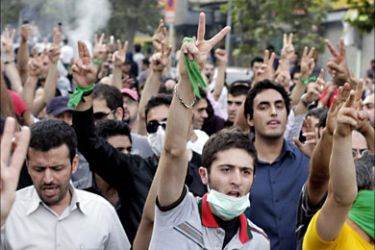 Supporters of opposition leader Mirhossein Mousavi march in north Tehran July 30, 2009. Baton-wielding Iranian police fired tear gas on Thursday and arrested protesters