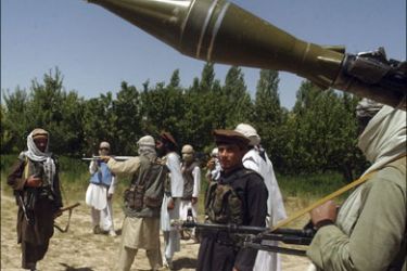 r : Taliban fighters are seen in an undisclosed location in Afghanistan July 14, 2009. Around 4,000 U.S. Marines and hundreds of NATO and Afghan forces are taking part in an