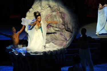Tunisian singer Asmaa Ben Ahmed (C) performs the musical comedy "Assabah Ajjadid" (A New Morning) during the opening ceremony of the International Carthage