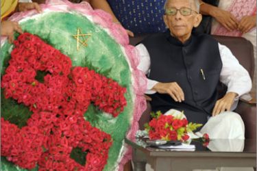 Indian veteran communist leader Jyoti Basu receives flower tributes from well-wishers on his 96th birthday at his residence in Kolkata on July 8, 2009