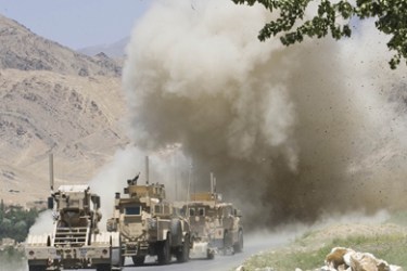 U.S. soldiers of 10th Mountain Division detonate discovered improvised explosive device (IED) placed on the road near Combat Operation Outpost (COP) Conlon in mountains