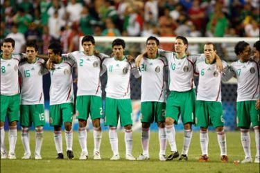CHICAGO - JULY 23: Players from Mexico line up on the pitch during the shoot out against Costa Rica during their CONCACAF Cup Semifinal match at Soldier Field on July 23,